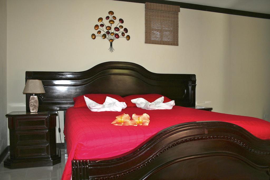 Tuanis Aparthotel Jacó Zimmer foto