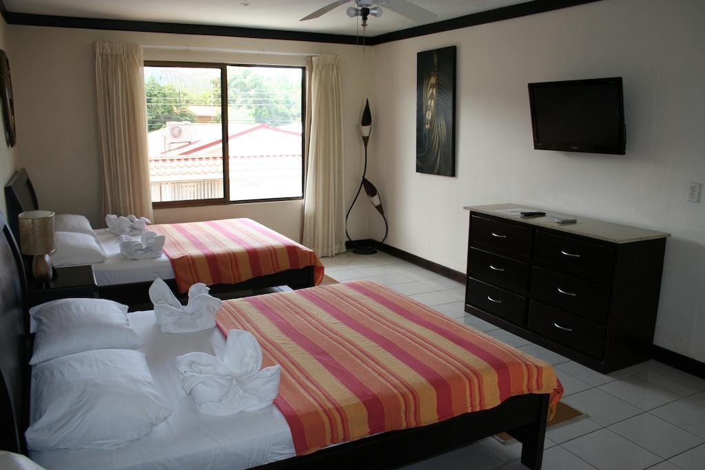Tuanis Aparthotel Jacó Zimmer foto